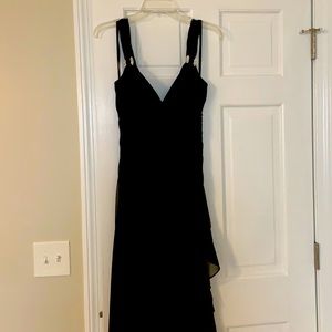 Woman’s fancy black dress